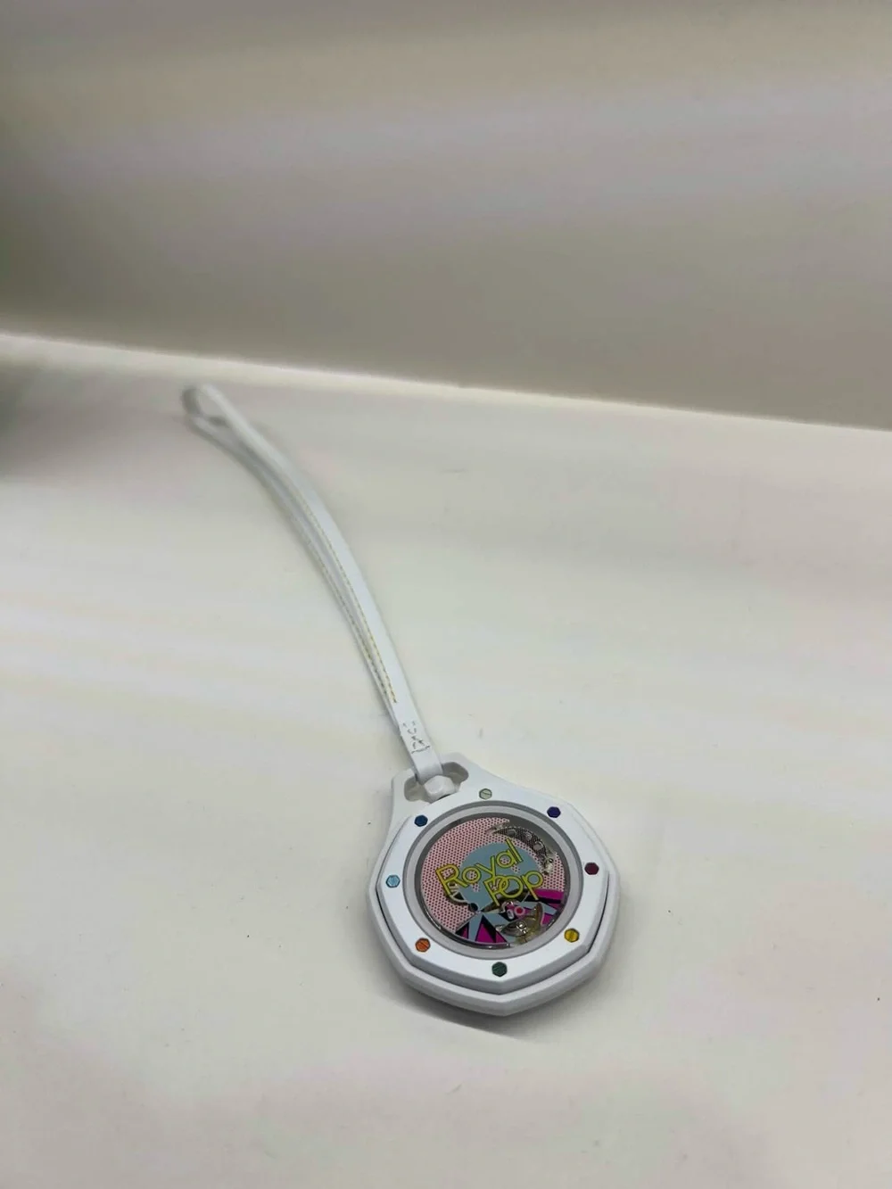 Audemars Piguet White Dial Watch with Multicolor Markers and Blue Packaging